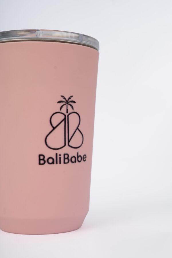 a pink cup with a logo on it